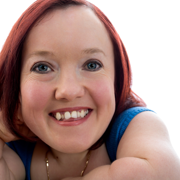 A woman smiling.