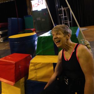 A woman laughing.