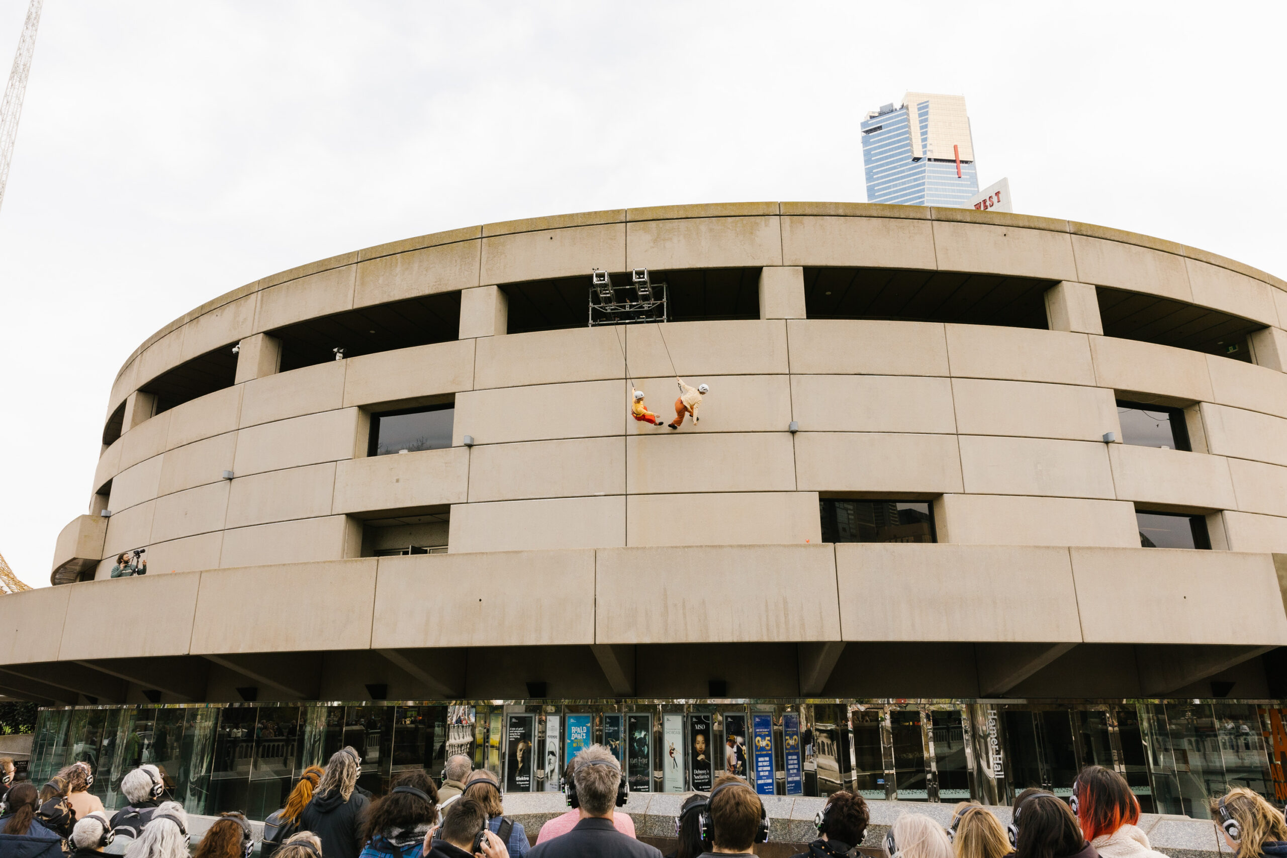 Anso Swann Buiget and Tarn Scully wall running on Arts Centre Melbourne in Momentum performance. Credit Kate Disher-Quill